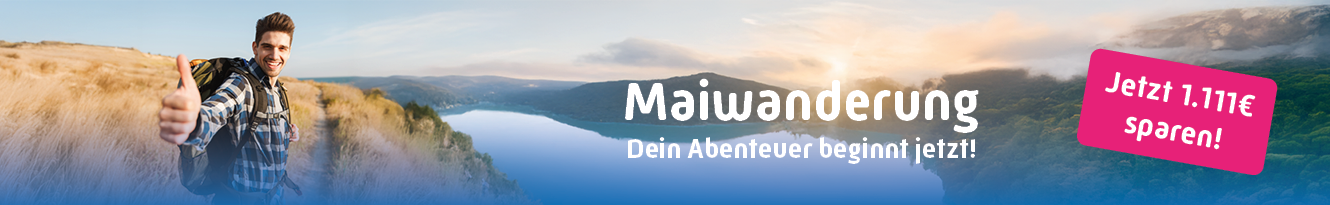 Mann mit Rucksack zeigt Daumen hoch bei einer Wanderung in bergiger Landschaft mit See. Text: „Maiwanderung – Dein Abenteuer beginnt jetzt!“ Rechts ein Banner: „Jetzt 1.111 € sparen!“